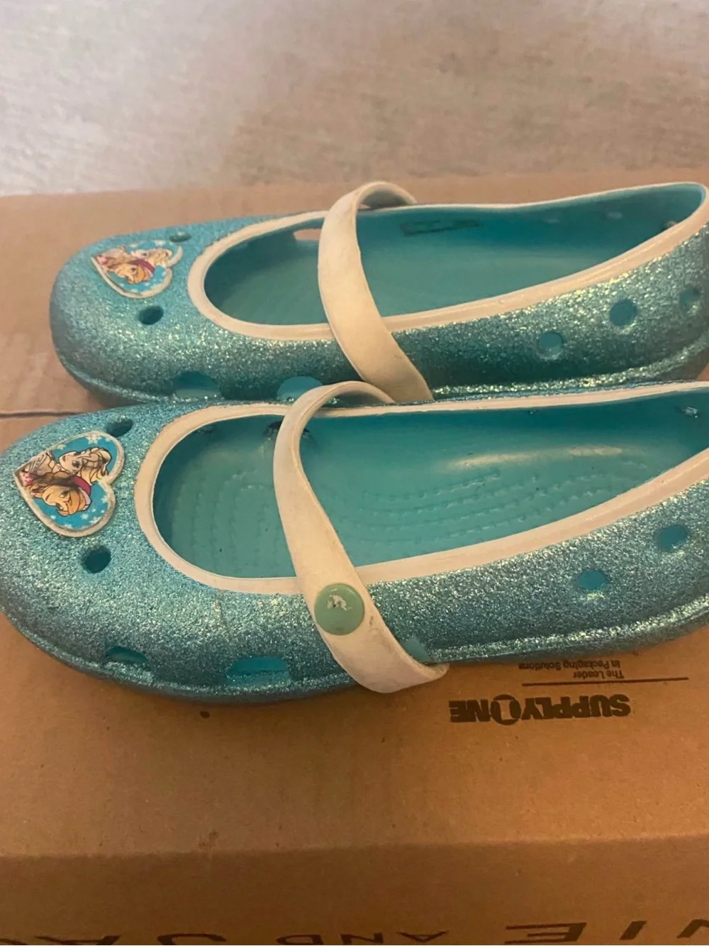 Girls Glitter Blue Crocs with Elsa & Anna Accent